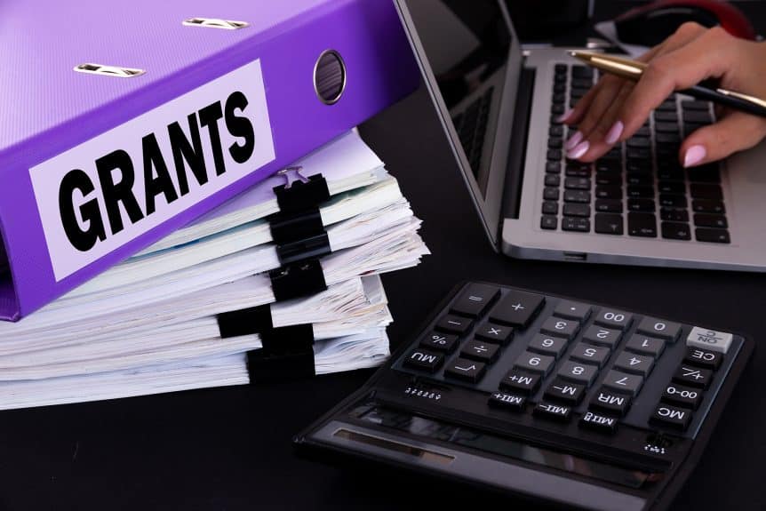 Grant notebook with documents bound together